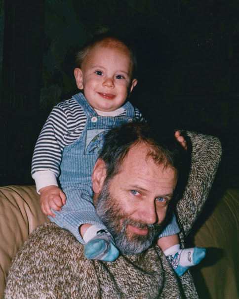 Photo of founder Anthony carrying a young Logan on his shoulders